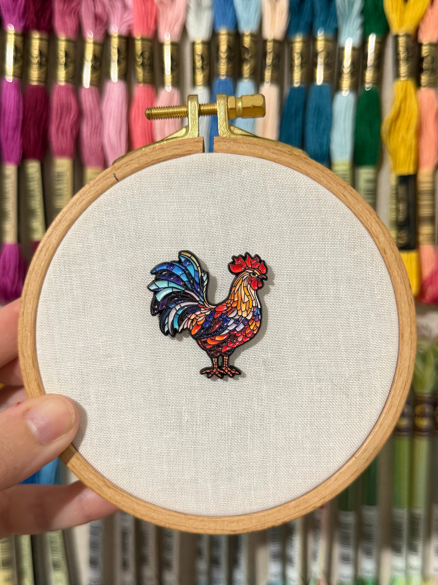 Stained glass rooster soft enamel needle minder on a 100mm embroidery hoop